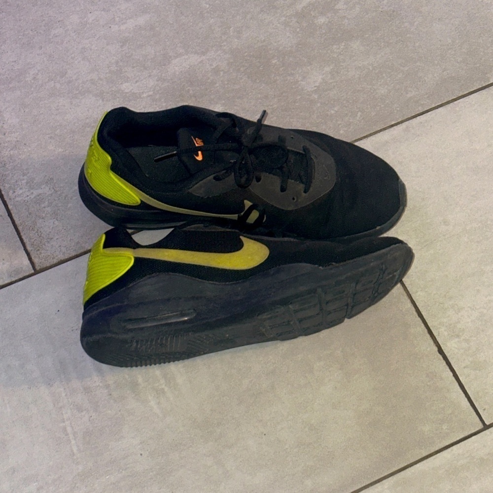 Green and black Nikes
